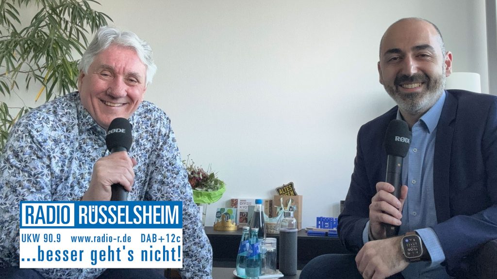 Achim Weidner im Gespräch mit Bürgermeister Murat Karakaya über Sprache, Sprachfähigkeit und generative KI